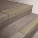 Light Bronze finish 66x55mm raked back aluminium stair nosing with a Light Bronze Aluminium insert, fitted to interior steps