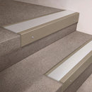 Light Bronze finish 66x55mm raked back aluminium stair nosing with a Satin Aluminium insert, fitted to interior steps
