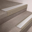 Light Bronze finish 66x55mm raked back aluminium stair nosing with a Satin Aluminium insert, fitted to interior steps