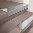 Mill Aluminium finish 66x55mm raked back aluminium stair nosing with a Polished Aluminium insert, fitted to interior steps