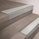 Mill Aluminium finish 66x55mm raked back aluminium stair nosing with a Satin Aluminium insert, fitted to interior steps