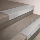 Satin Aluminium finish 66x55mm raked back aluminium stair nosing with a Satin Aluminium insert, fitted to interior steps