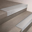 Satin Aluminium finish 66x55mm raked back aluminium stair nosing with a Satin Aluminium insert, fitted to interior steps