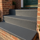 Charcoal FootGrip anti-slip step paint applied to concrete steps, a brick-built UK front doorstep with three steps