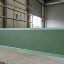 Mid Green FootGrip anti-slip step paint applied to concrete steps, warehouse loading-bay concrete steps