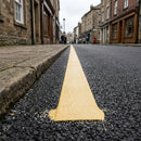 Thermoplastic road line marking tape – deep cream heritage line applied to asphalt