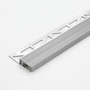 Tile-in aluminium stair nosing 25mm with grey replaceable PVC tread and perforated anchoring leg, studio view