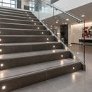 Anti-slip aluminium stair nosing with replaceable insert on commercial stone stairs UK