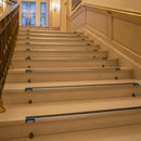Aluminium tile-in stair nosing with anti-slip insert on luxury hotel marble staircase UK