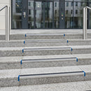 Anti-slip aluminium stair nosing installed on outdoor granite steps modern UK office building