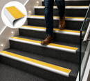Carpet stair nosing with yellow anti-slip rubber insert